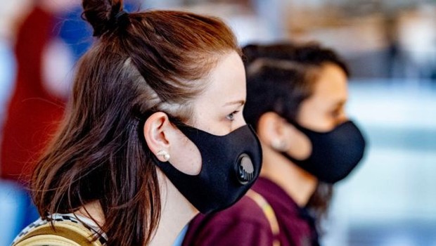 The 2020 Look: Face coverings are mandatory for those stepping out (Photo: GETTY IMAGES)