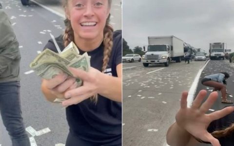 American road covered with cash after armored truck door opened – Marie Claire Magazine